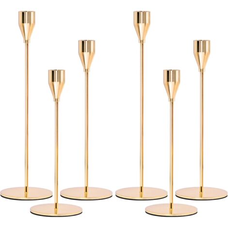 Un ensemble de 6 chandeliers en or et argent(or)
