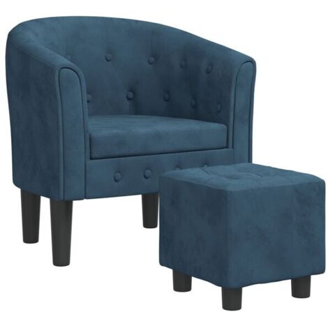 Un fauteuil avec repose-pieds, recouvert de velours bleu foncé.