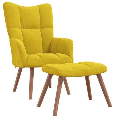 Un fauteuil inclinable avec repose-pieds, en velours jaune moutarde.