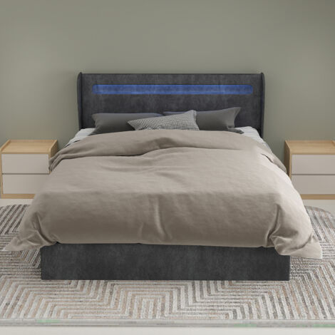 Un lit moderne au style minimaliste, doté d'une tête de lit rembourrée en tissu doux. Dimensions : 140 x 200 cm. Équipé d'un mécanisme de levage à vérins à gaz. Matelas non inclus.