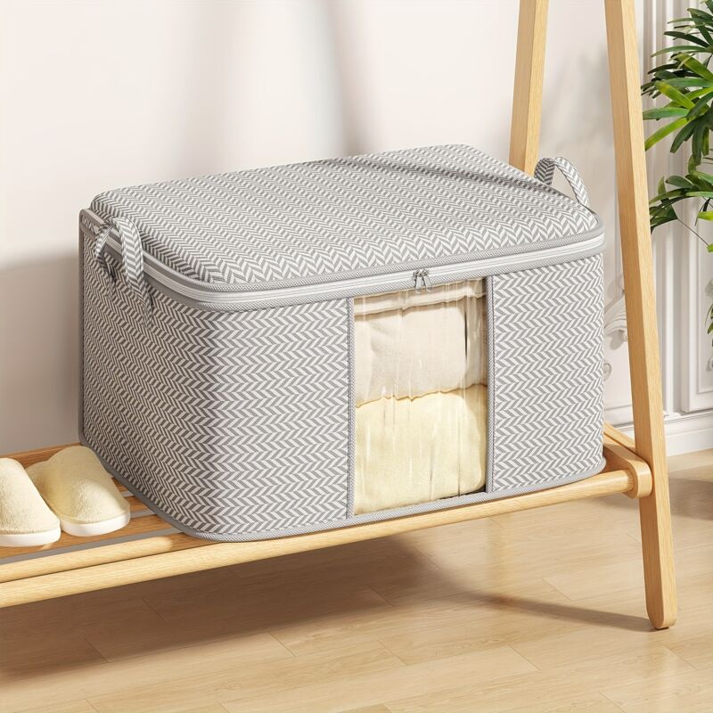 Un sac de rangement extra-large avec fenêtre transparente et poignées renforcées, adapté aux couvertures, couettes, oreillers et linge de lit (M)