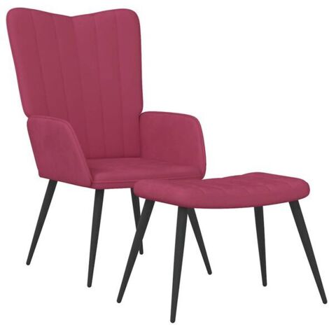 Une chaise longue avec repose-pieds, en velours bordeaux.