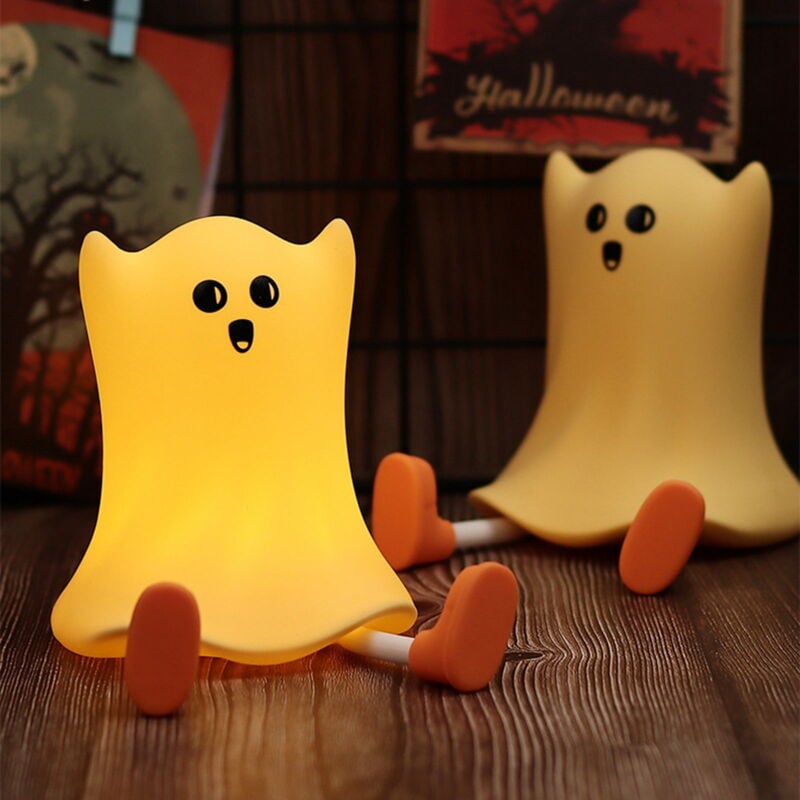 Veilleuse LED fantôme avec lumières douces et chaudes, idéale pour les soins de bébé. Peut être utilisée comme support de téléphone.