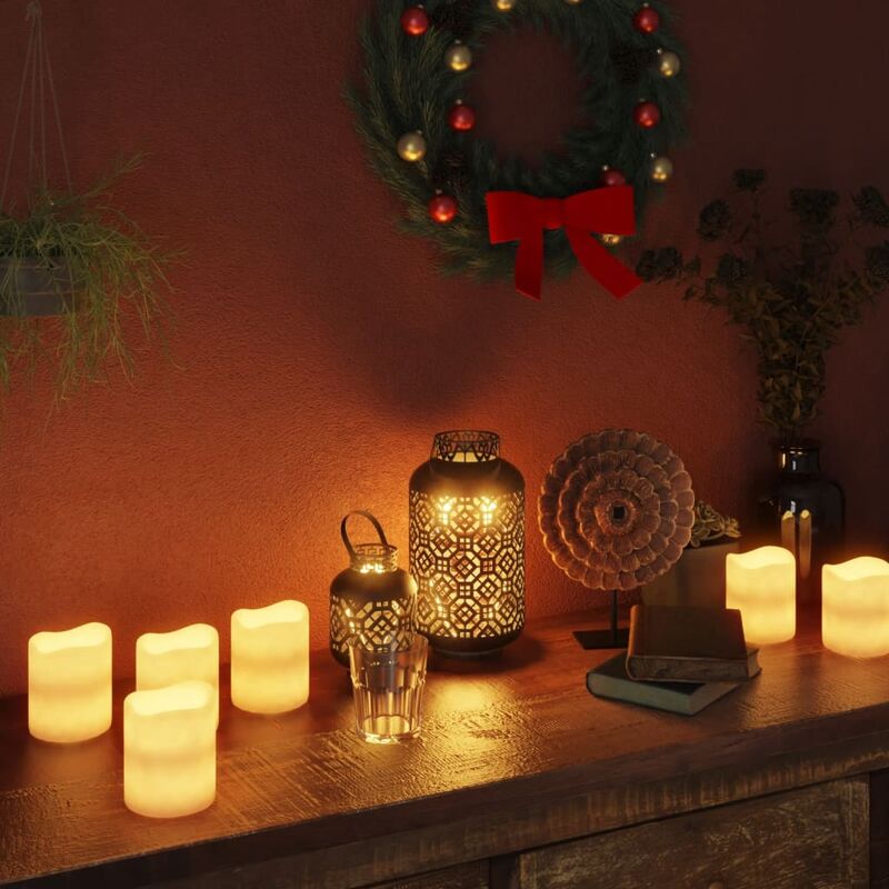 

Velas LED temporizador y mando distancia 12 uds blanco cálido