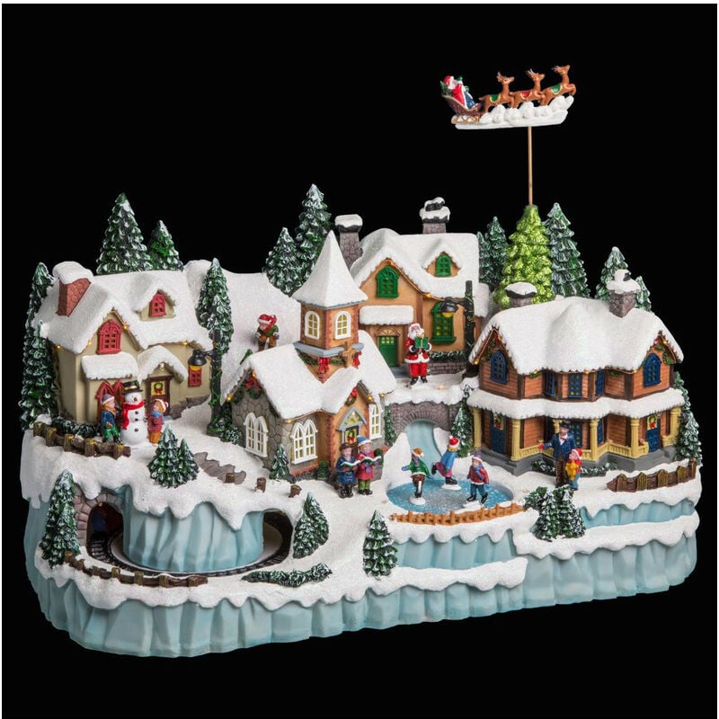 Fééric Lights And Christmas - Village de Noël lumineux et animé avec Train Enfants sur patinoire et Père Noël sur son traîneau - Feeric Christmas