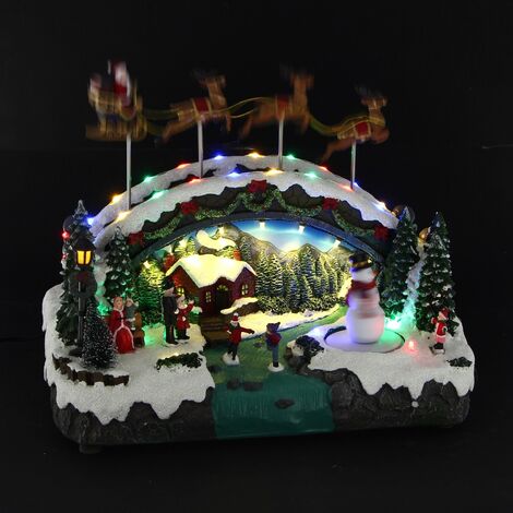 Village de Noël lumineux LED animé musical Petit Train et Patineurs