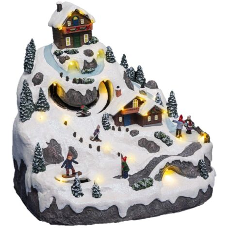 Village de Noël lumineux et musical à la montagne